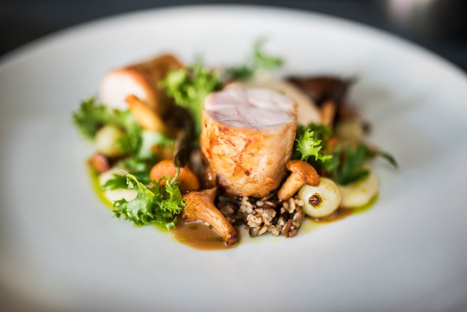 A sophisticated plated dinner setting at a corporate event
